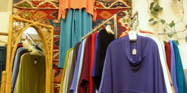Clothing store interior with hanging garments